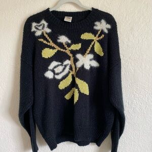 Black knit sweater with flower pattern